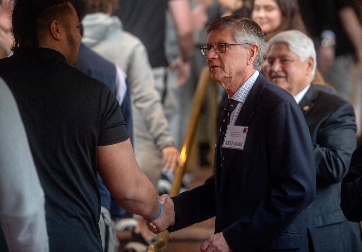 Richard Frank, President & CEO of Lawry’s Restaurants, greets the Penn State football team as they arrive for the Lawry’s Beef Bowl on Friday, Dec. 30, 2022.