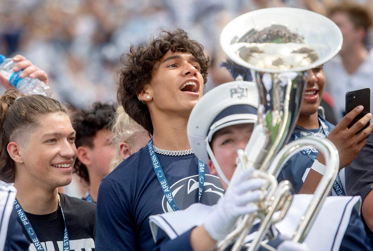 Penn State football recruit Tony Rojas cheers as the band plays before the team came out for the game against Ohio on Saturday, Sept. 10, 2022.