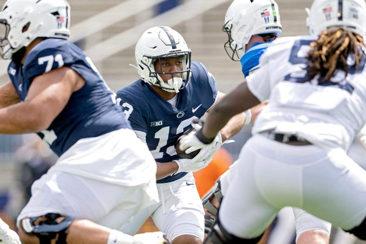 Penn State running back Kaytron Allen runs with the ball during the Blue-White game on Saturday, April 26, 2025.