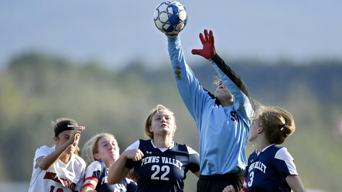 Penns Valley goalie Kylie Auman knocks the ball away during the soccer game against Bellefonte on Wednesday, Oct. 1, 2018.