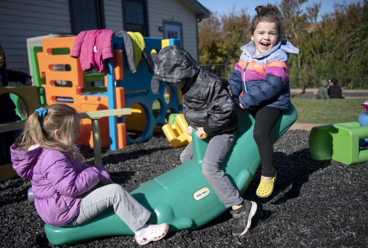 Students in the Pre-K Counts class laugh as they play outside on Thursday, Oct. 24, 2019 at the Learning Station.