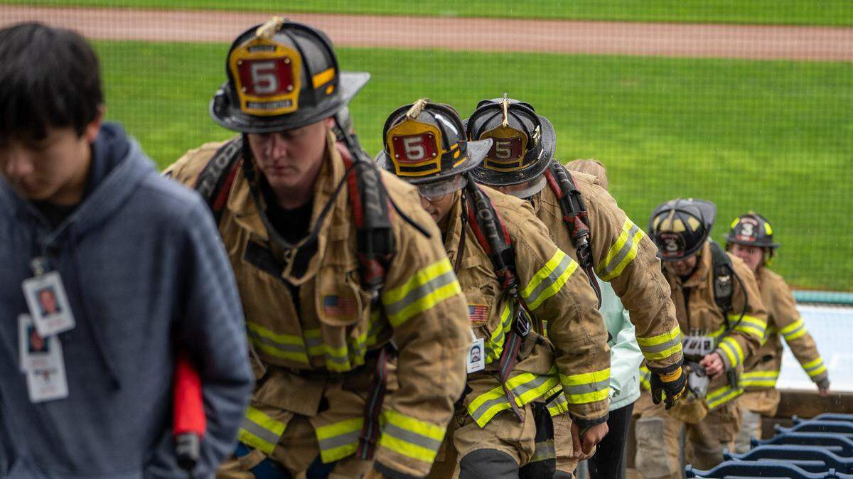 Firefighters climb steps at Medlar Field in full gear to honor first responders. The annual Central PA 9/11 Memorial Stair Climb will be held on Sept. 17.