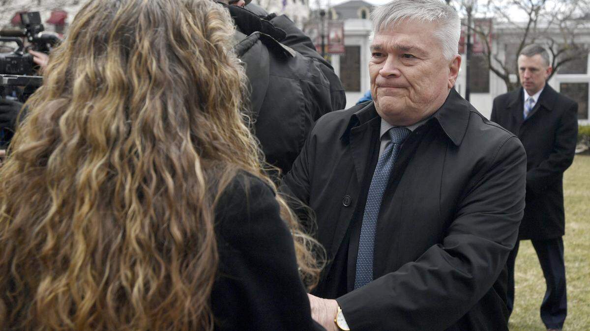 Penn State President Eric Barron shakes hands with Evelyn Piazza in March after the anti-hazing legislation named after her late son, Timothy Piazza, was introduced outside of the Centre County Courthouse. Barron is pushing for the creation of a national database to help universities combat fraternity and sorority life challenges.