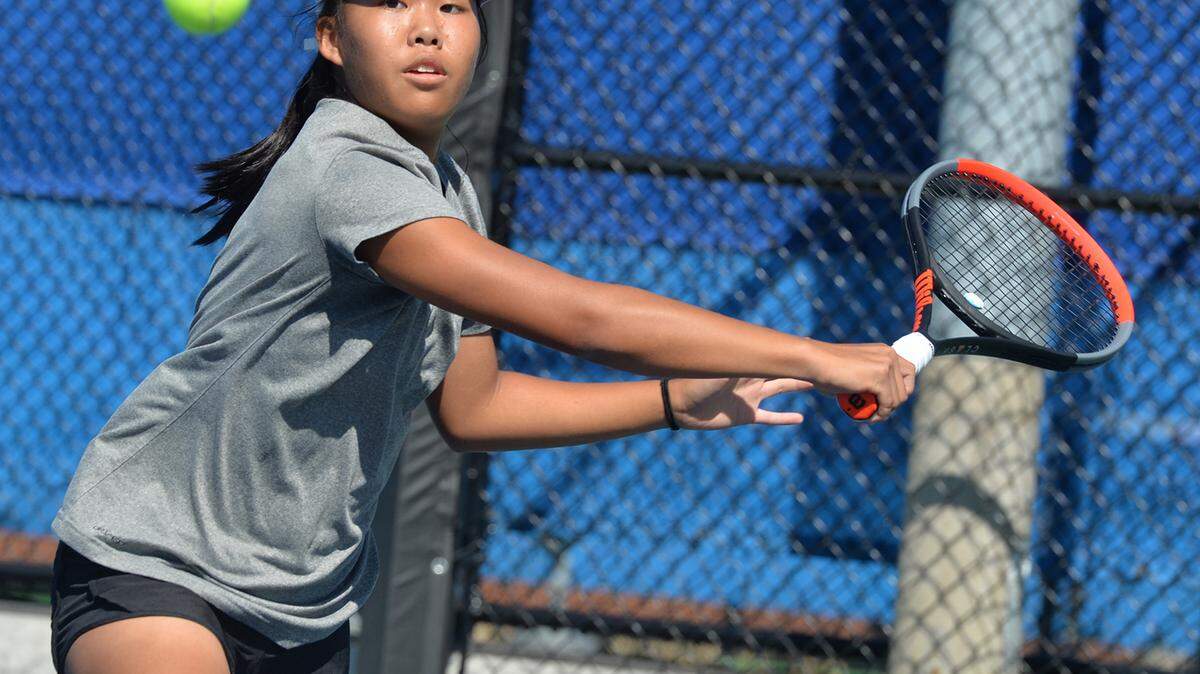 State College High School’s Quiana Guo competes against Hollidaysburg’s Gretta Rhodes for the District 6 AAA Singles championship on Wednesday, Sept. 21, 2021, at Altoona Area High School’s Mansion Park courts.
