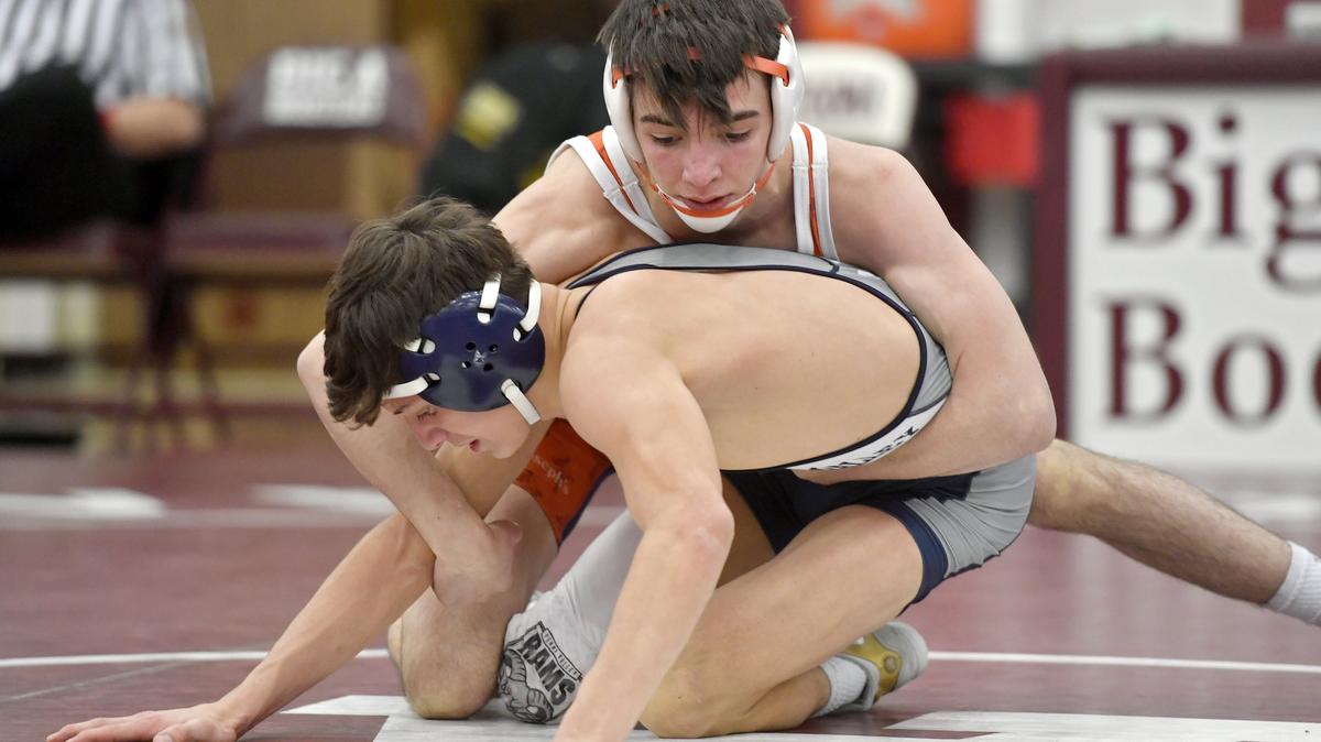 Saint Joseph’s Amonn Ohl controls Penns Valley’s Baylor Shunk in the 120 lb championship bout during the District 6 2A finals on Saturday, Feb. 16, 2019.