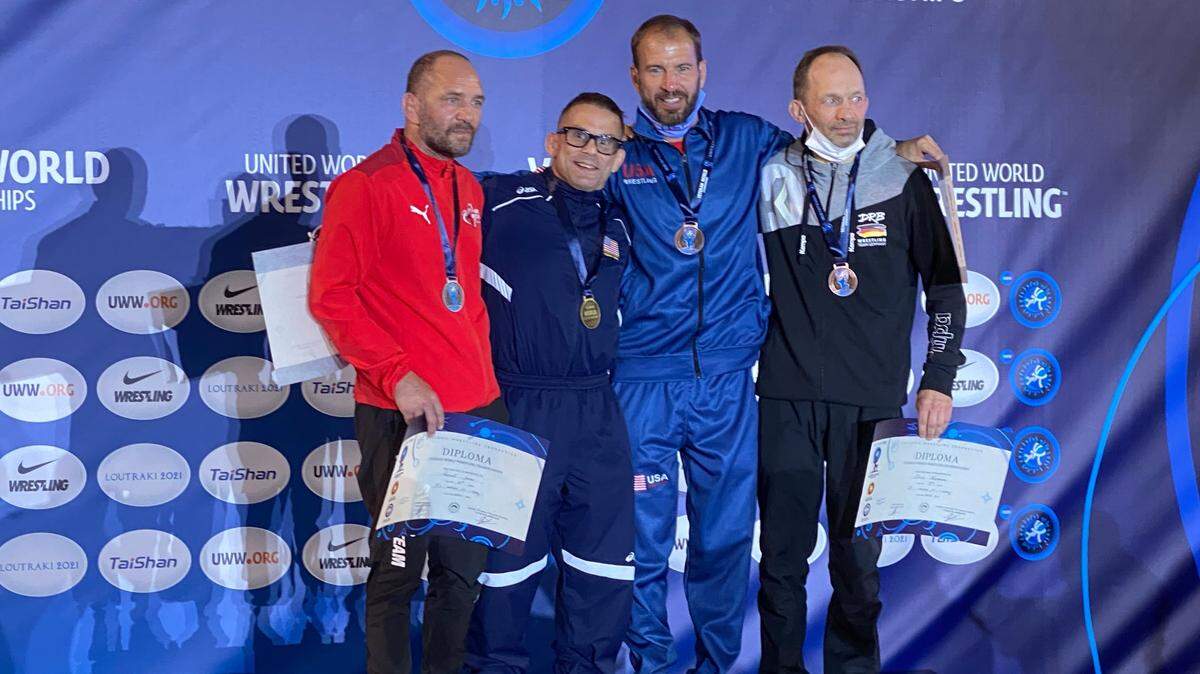 State College native Rob Prebish (second from left) poses with other placewinners of the 62 kilogram “C” Division class at the Veterans United World Wrestling Championships in Loutraki, Greece last week. Prebish claimed a gold medal in the 45-50-years old group.