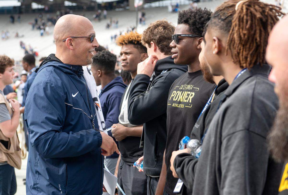 Penn State football coach James Franklin talks to recruits after the Blue-White game on Saturday, April 15, 2023.