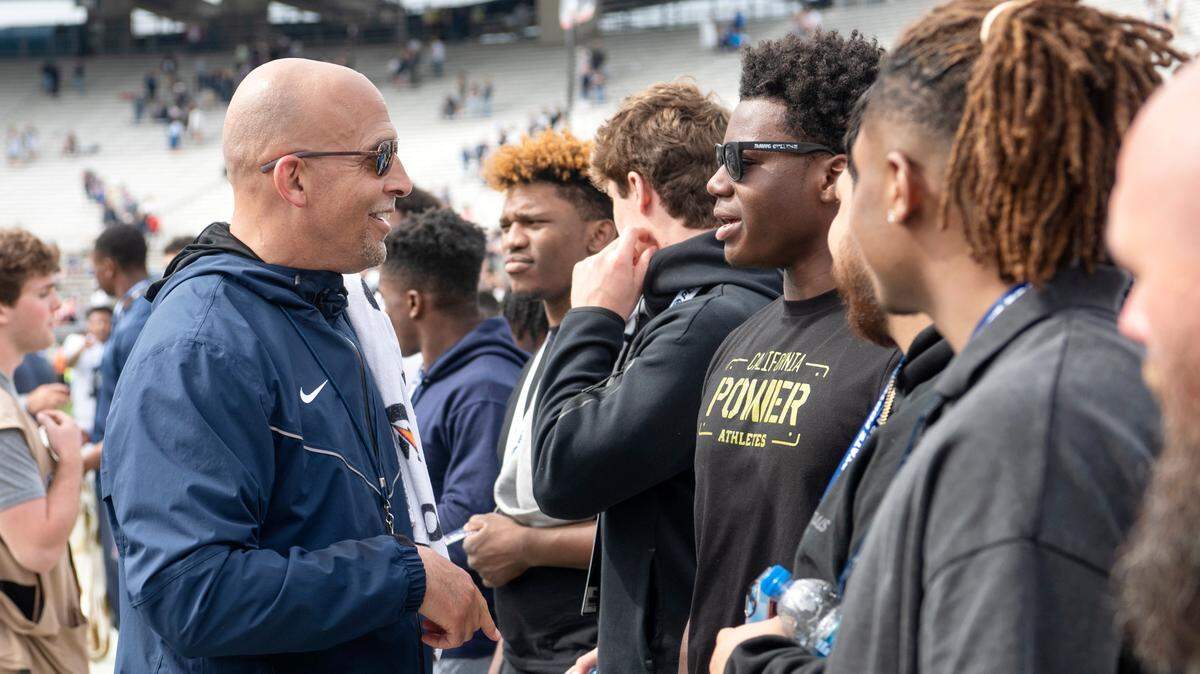 Penn State football coach James Franklin talks to recruits after the Blue-White game on Saturday, April 15, 2023.