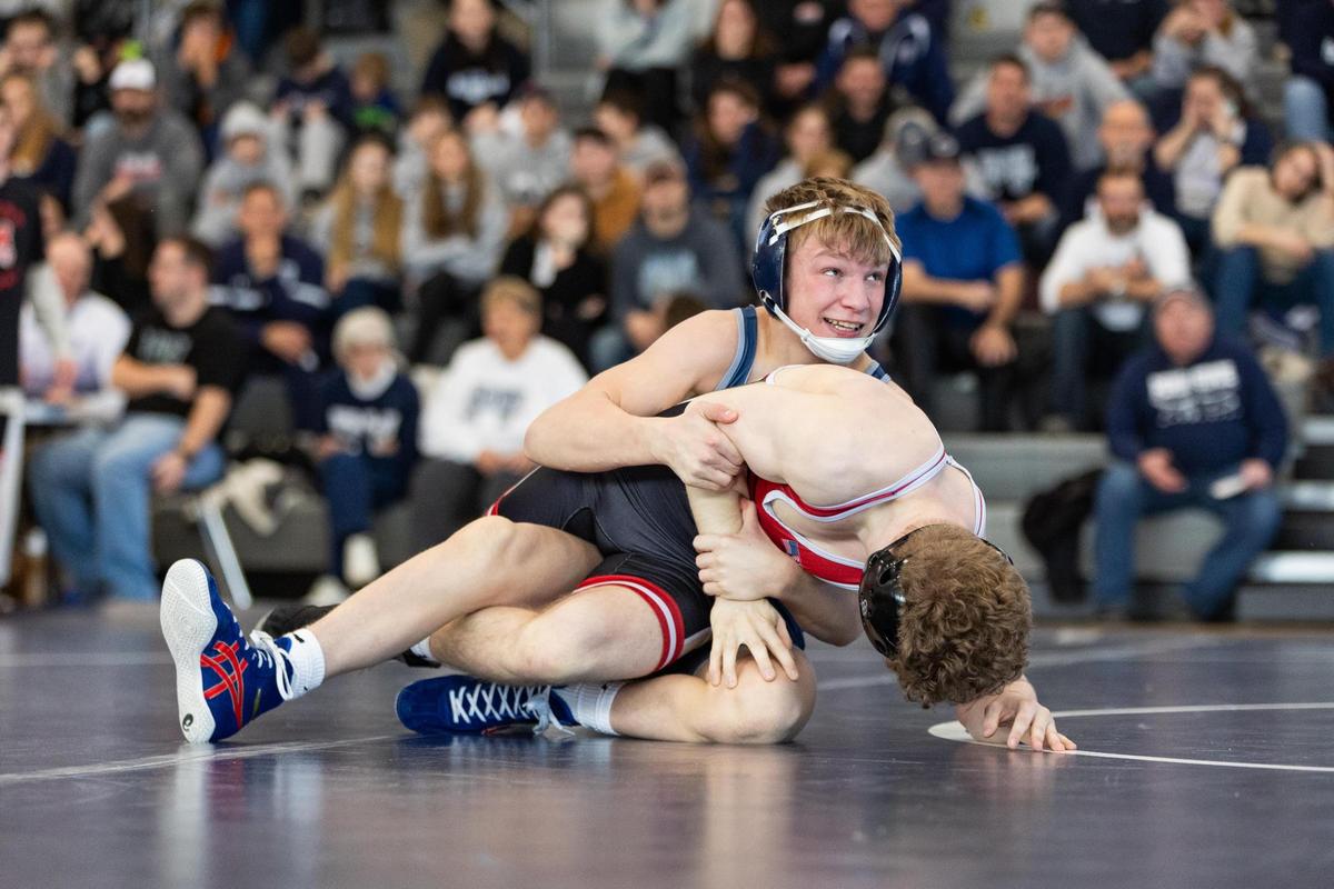 Penns Valley’s Erik Carlile controls Bishop McCort’s Austen Carfley in their 127-pound bout of the Rams’ 59-6 loss in the District 6 Class 2A finals on Feb. 1 in Spring Mills. Carlile defeated Carfley, 3-1.