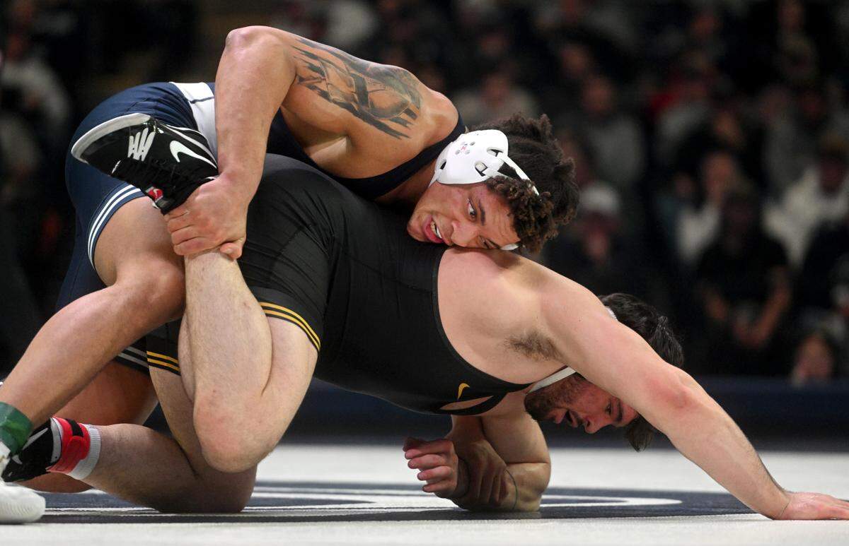 Penn State’s Greg Kerkvliet controls Iowa’s Tony Cassioppi in the 285 lb bout of the match on Friday, Jan. 27, 2023. Kerkvliet won by decision, 4-1.