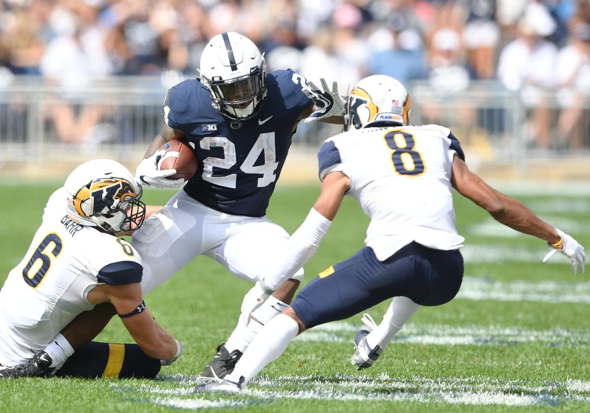 Penn State running back Miles Sanders shakes a defender during a game against Kent State Saturday, Sept. 15, 2018 at Beaver Stadium.