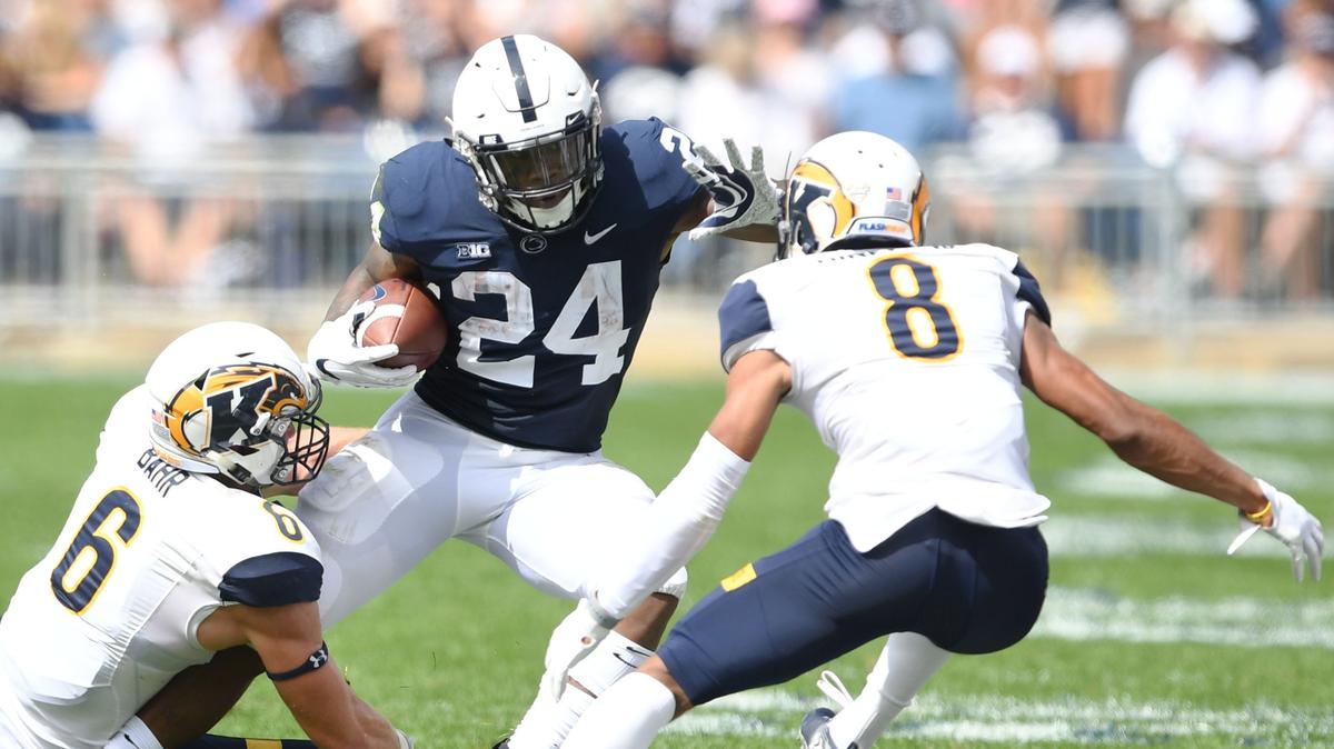 Penn State running back Miles Sanders shakes a defender during a game against Kent State Saturday, Sept. 15, 2018 at Beaver Stadium.