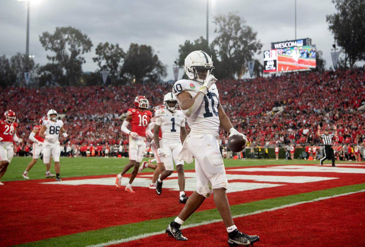 Penn State running back Nick Singleton celebrates his touchdown during the game against Utah in the Rose Bowl on Monday, Jan. 2, 2023.