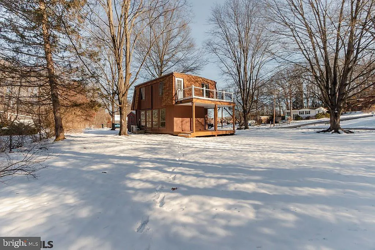 A view of the backyard and covered deck at 466 Douglas Drive. Photo shared with permission from home’s listing agent, Tracy Barter of RE/MAX Centre Realty.