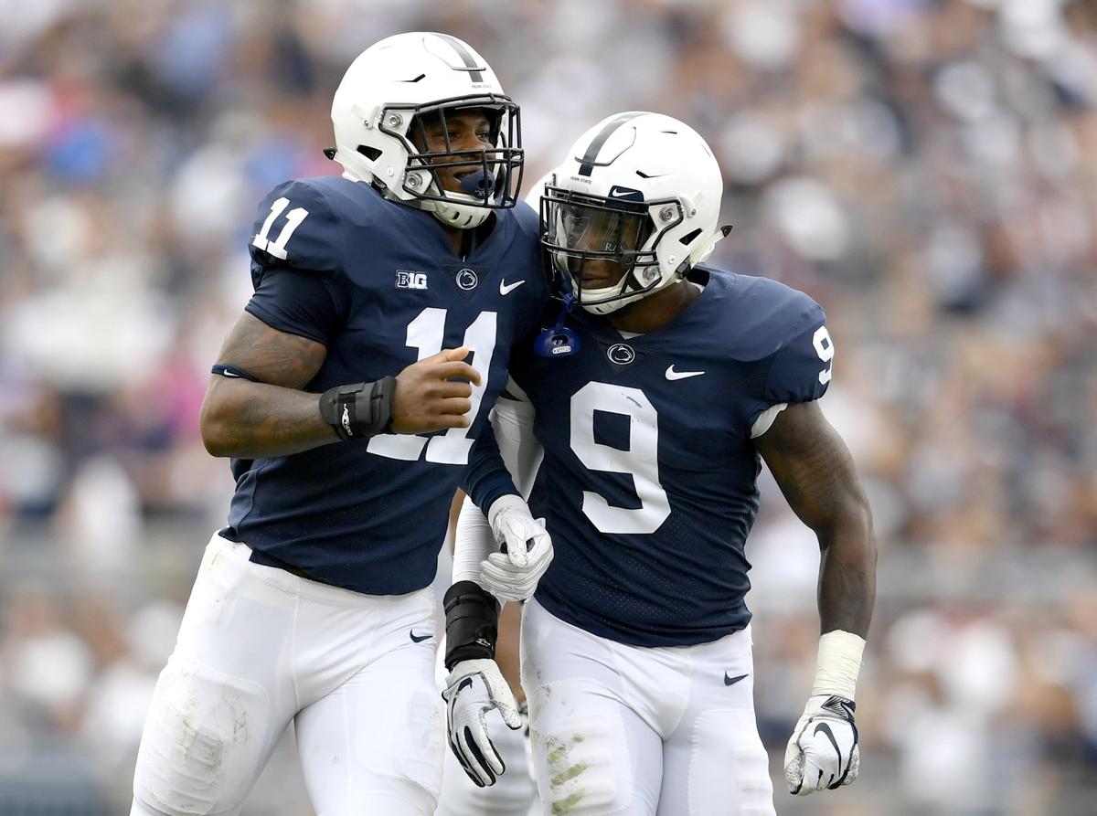Penn State linebacker Micah Parsons is congratulated by teammates after recovering a kickoff during the game Saturday, Sept. 1, 2018 against Appalachian State at Beaver Stadium.
