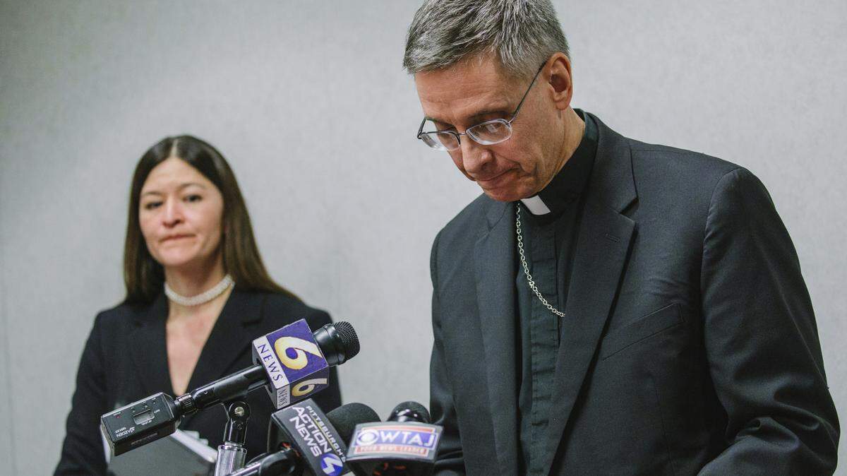 Bishop Mark Bartchak, right, of the Altoona-Johnstown Diocese, speaks at a news conference with Acting U.S. Attorney Soo Song in 2017 to announce new measures to protect the children of the diocese from future sexual abuse and to provide better help for victims, including new reporting requirements and the creation of an independent oversight board.