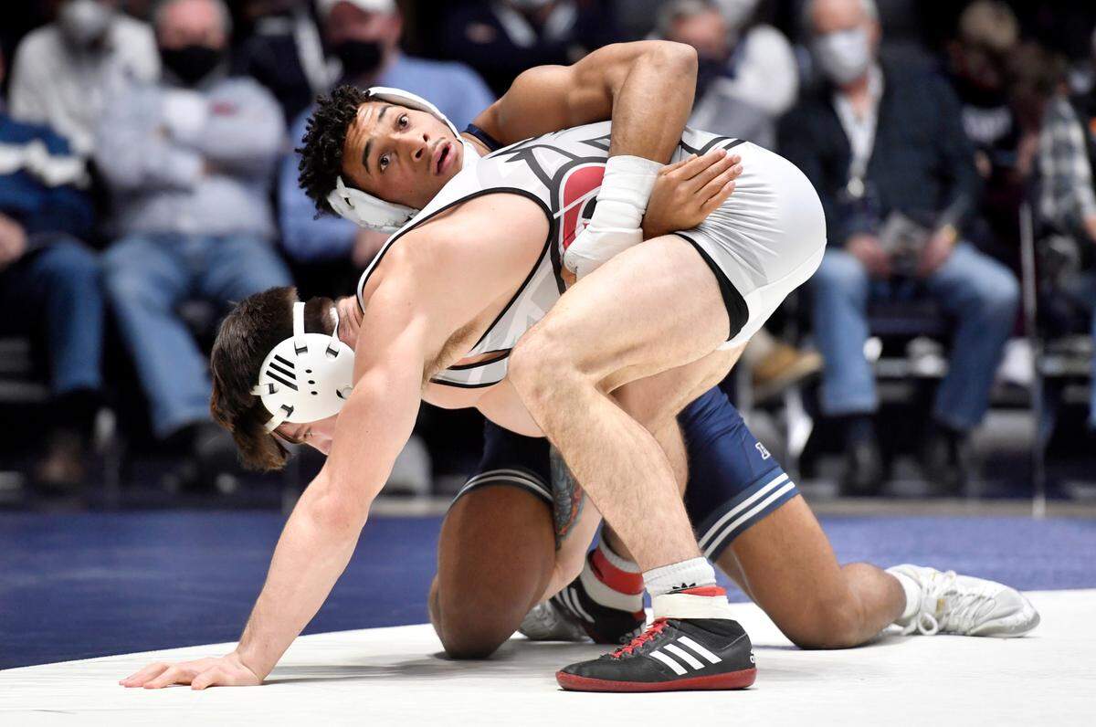 Penn State’s Carter Starroci controls Rider’s Shane Reisma in the 174 lb bout of the match on Sunday, Feb. 20, 2022.