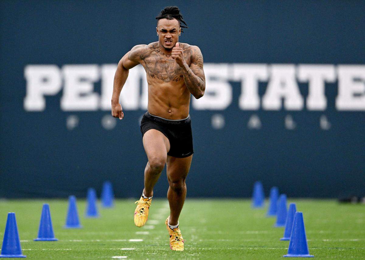 K.J. Winston runs the 40-yard dash during Penn State football’s pro day on Friday, March 28, 2025.