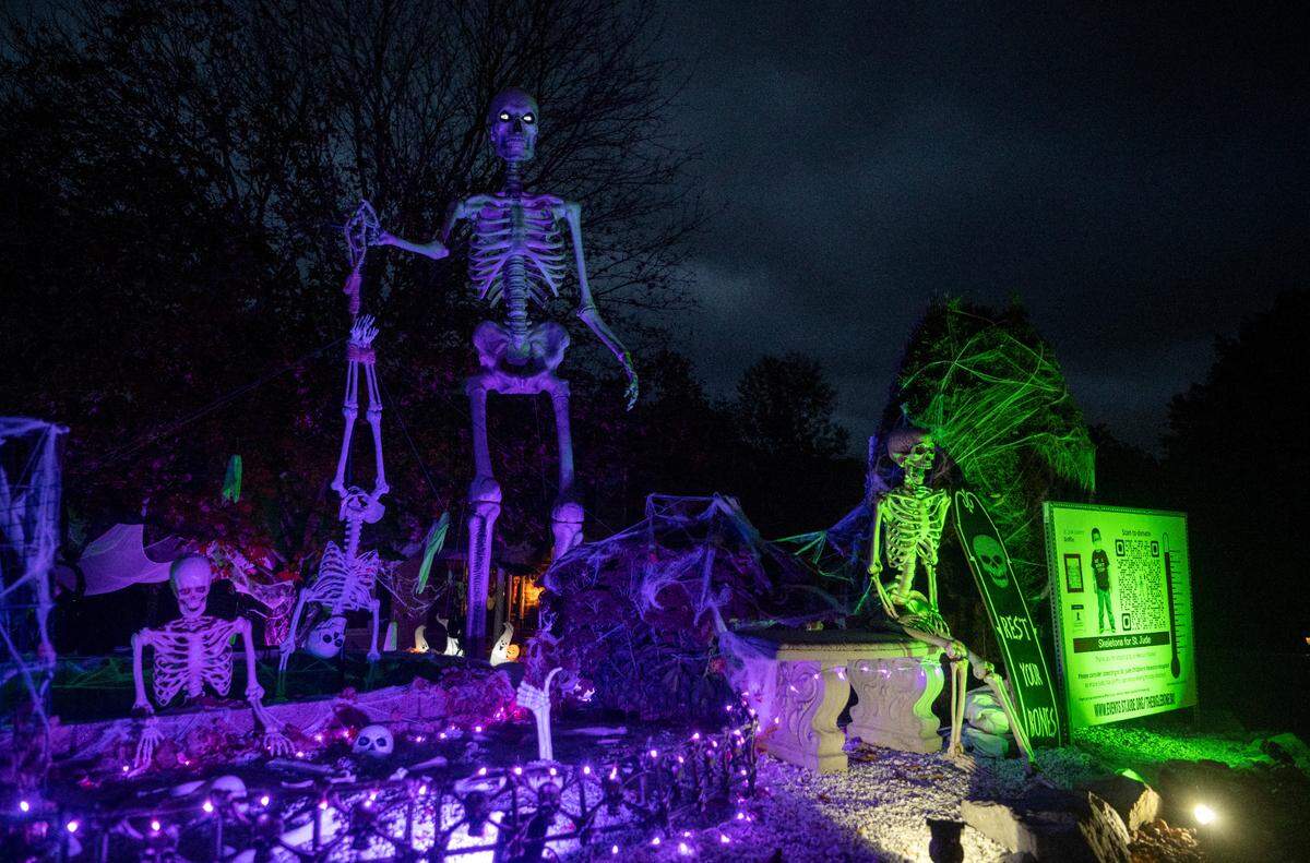 A Halloween display features “the Big LeBoneski” in the Mattie family’s yard at 1291 Pine Circle in Bellefonte to help raise money for Skeletons for St. Jude.