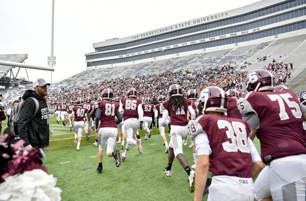 State College football runs onto the field at Beaver Stadium for the game against Cumberland Valley on Saturday, Oct. 26, 2019.