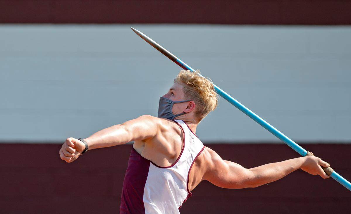 State College’s Ben Spencer competes in the javelin at the District 6 3A track and field championships at Mansion Park on May 20.