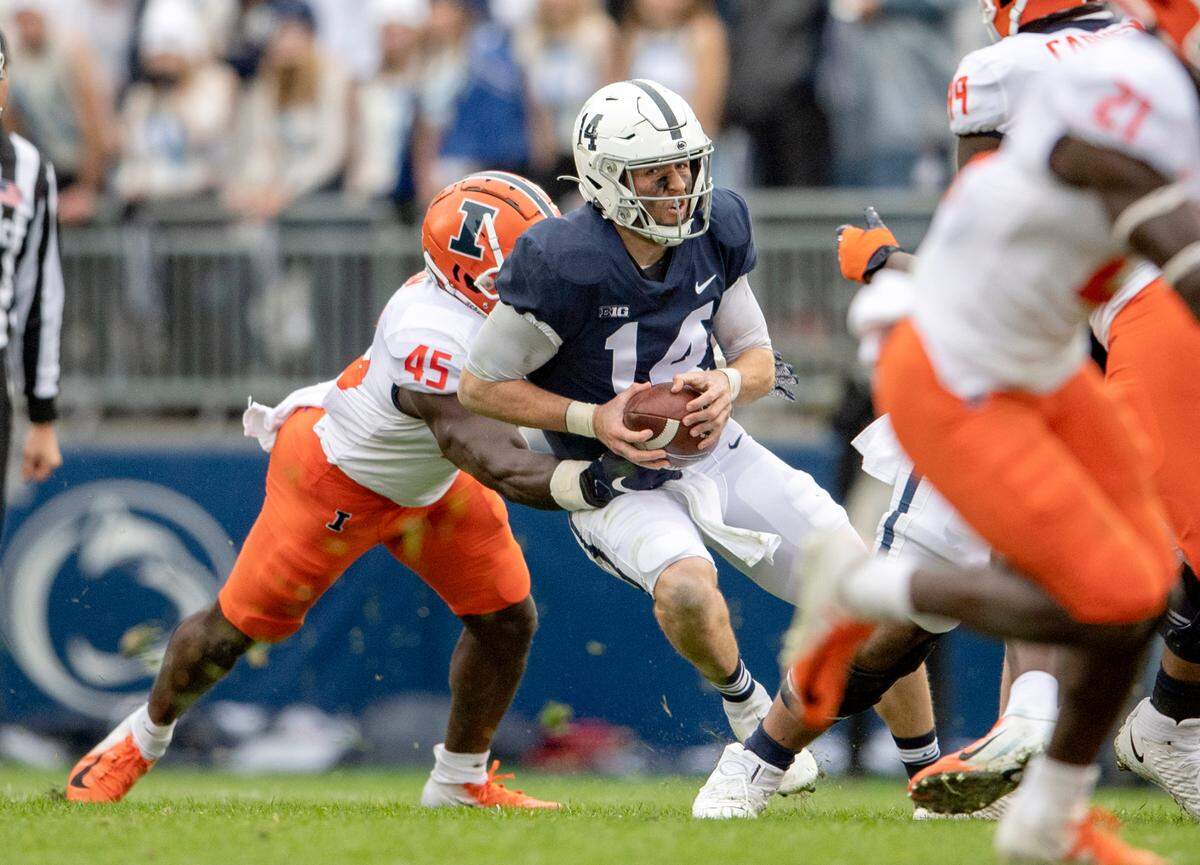 Illinois linebacker Khalan Tolson stops Penn State quarterback Sean Clifford during the game on Saturday, Oct. 23, 2021.