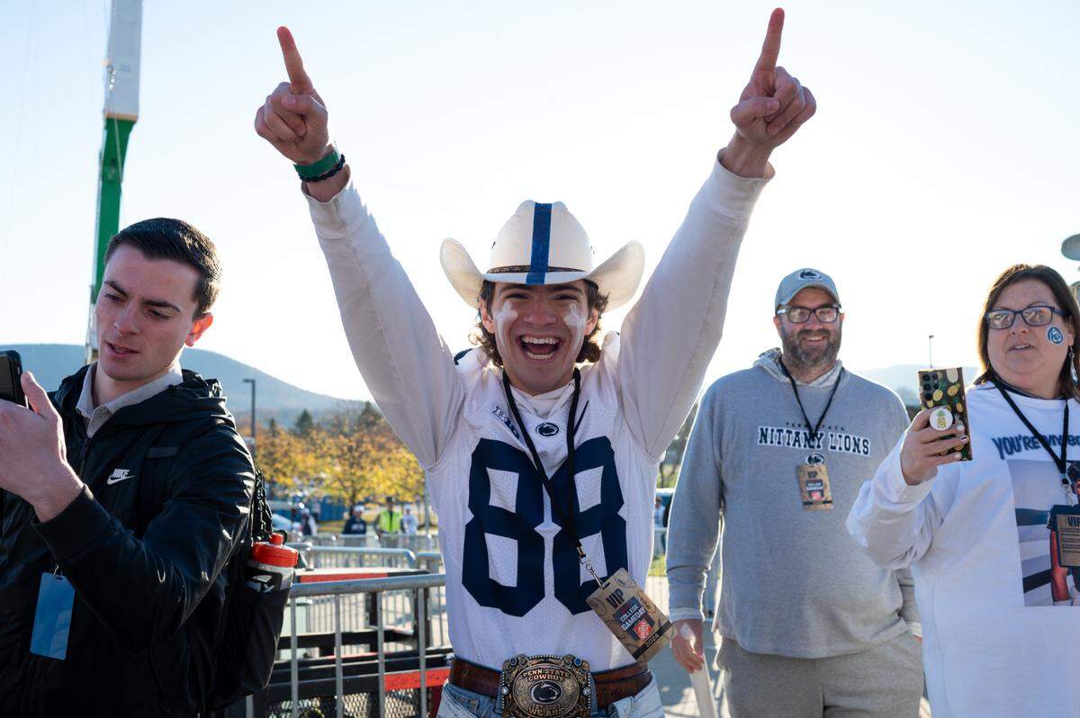 Nicky Pajovich cheers while behind set for ESPN College GameDay on Saturday, Nov. 2, 2024