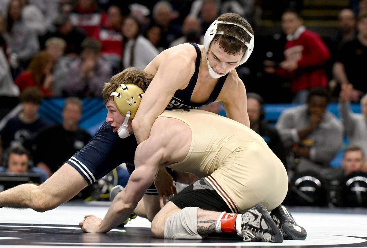 Penn State's Luke Lilledahl controls Minnesota’s Jore Volk in the 125-pound championship bout of the Big Ten wrestling championships on Sunday, March 8, 2026.