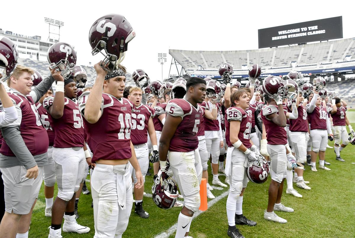 State College quarterback Brady Dorner sings the alma mater and celebrates the win over Cumberland Valley in the Beaver Stadium Classic on Saturday, Oct. 26, 2019.