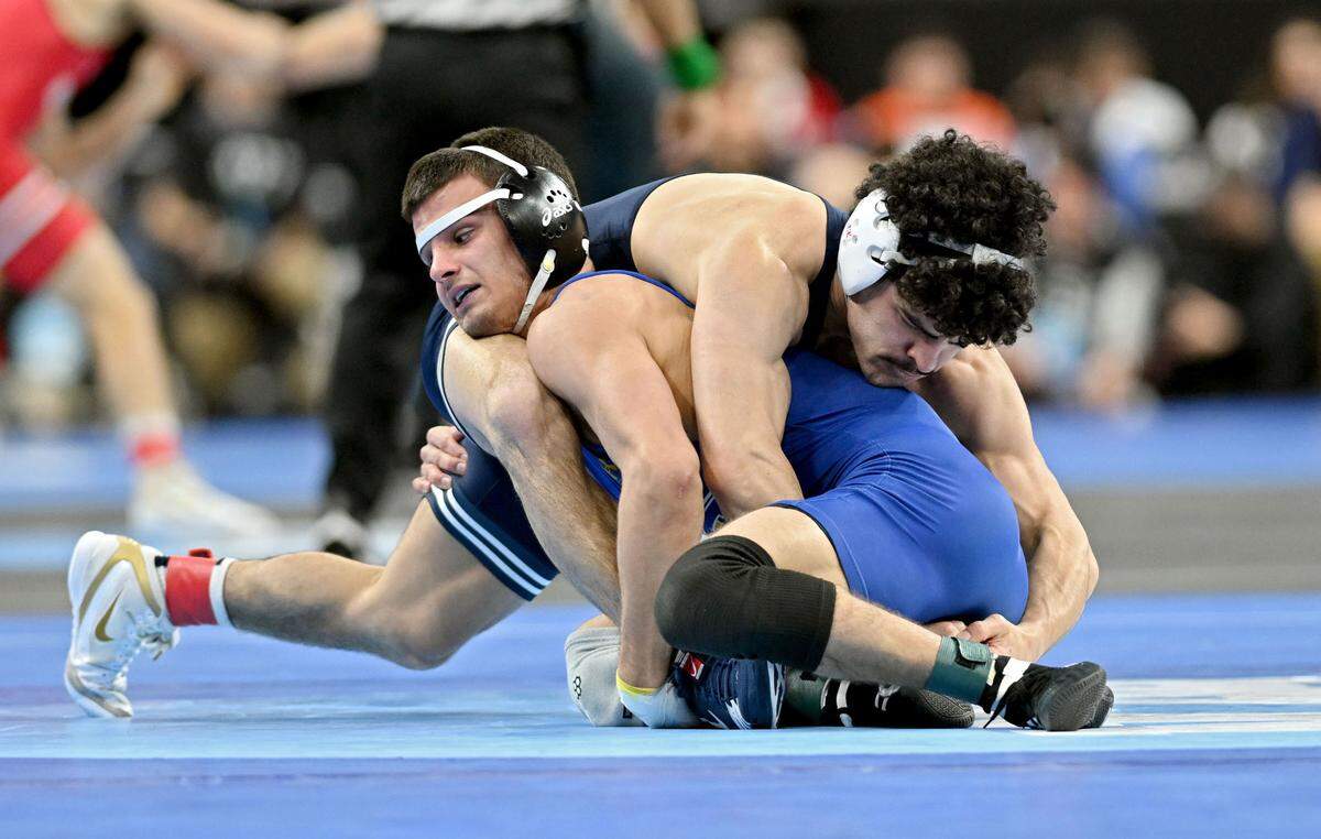 Penn State’s Beau Bartlett wrestles SDSU’s Julian Tagg in a 141-pound bout during the 2025 NCAA Wrestling Championships in Philadelphia on Thursday, March 20, 2025.
