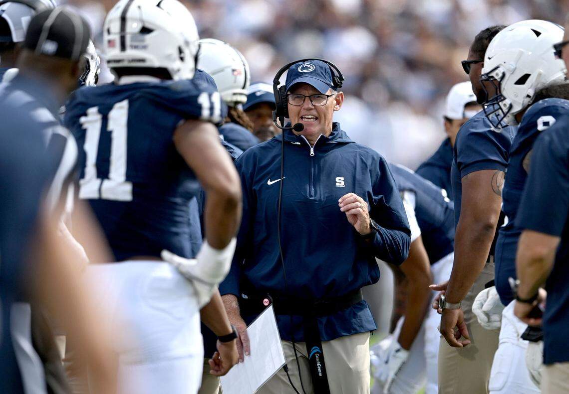 Penn State defensive coordinator Tom Allen talk to his players during a time out the game against Bowling Green on Saturday, Sept. 7, 2024.