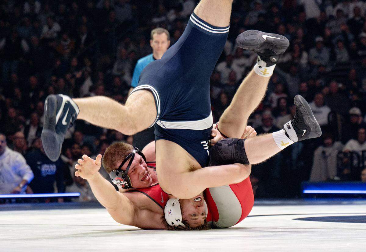 Penn State's Cole Mirasola wrestles Ohio State’s Nick Feldman in the 285 lb bout of the match on Friday, Feb. 13, 2026 at the Bryce Jordan Center.