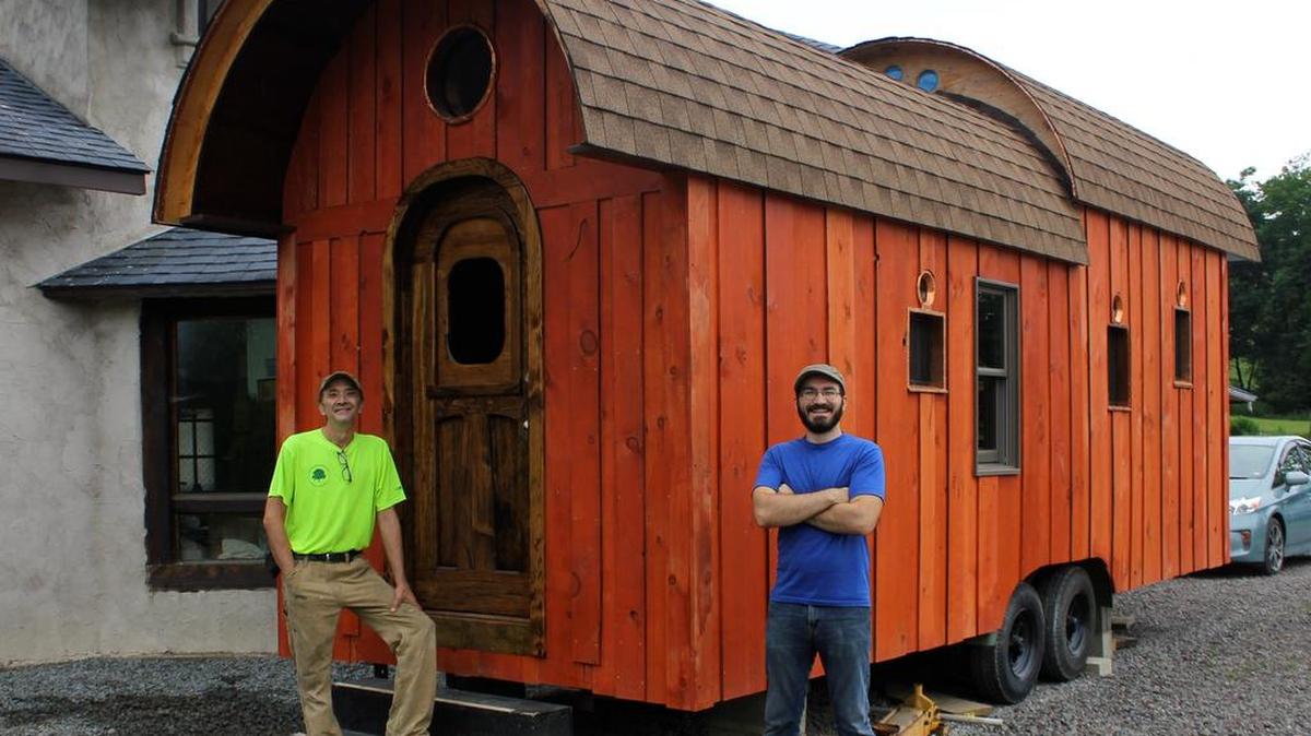 Nick Troisi, left, and his son, Aaron, have entered the tiny house business.