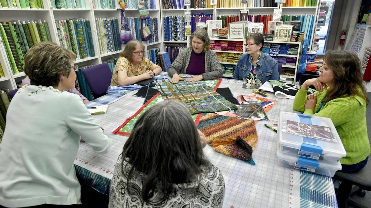 Artists gather at Stitch Your Art Out in Pine Grove Mills on April 18 to talk about projects they are working on.