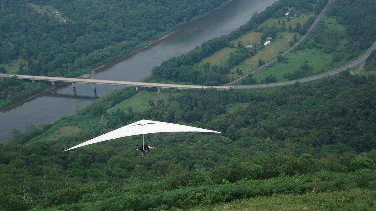 Hang gliders take to the air.