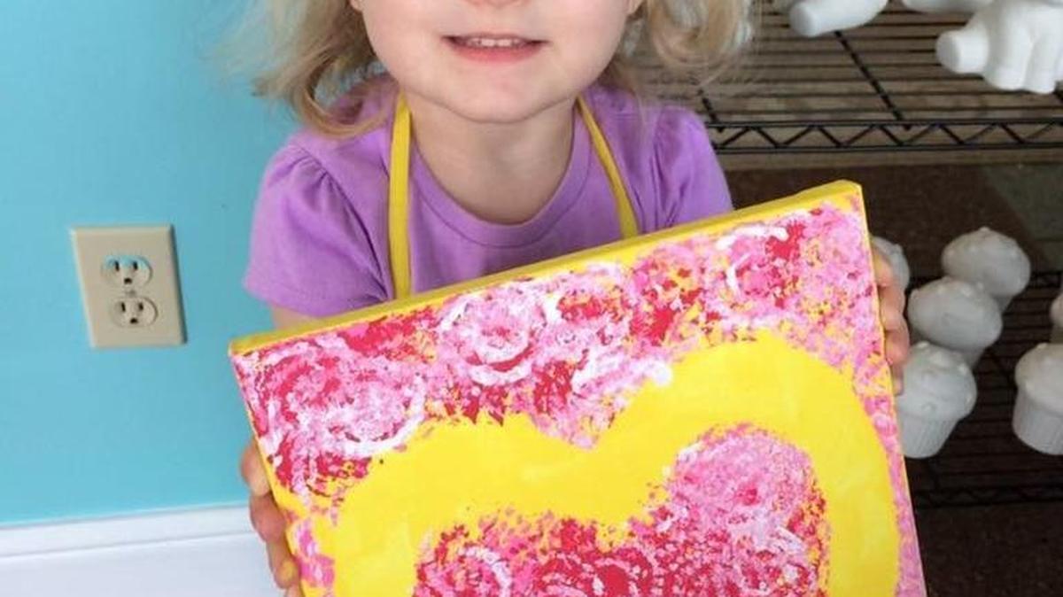 Zoey Mays shows her Two Painting Broads creation.