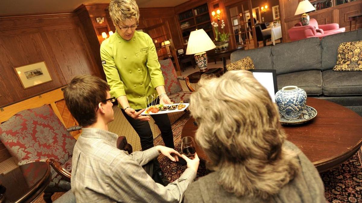 Chef Lisa Palermo shows appetizers for a Twilight dinner at Carnegie House in March 2014.