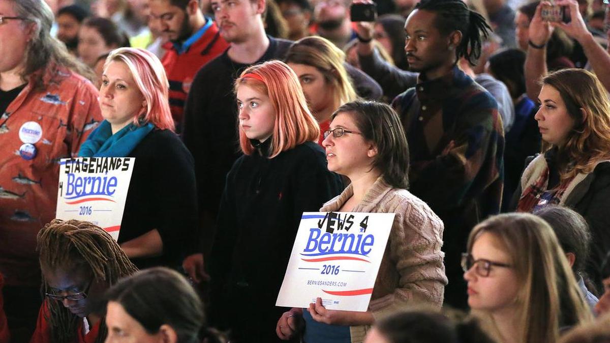 A crowd of youthful supporters listens as Democratic presidential candidate Bernie Sanders speaks to a packed crowd at the Fox Theatre in Atlanta on Nov. 23, 2015.