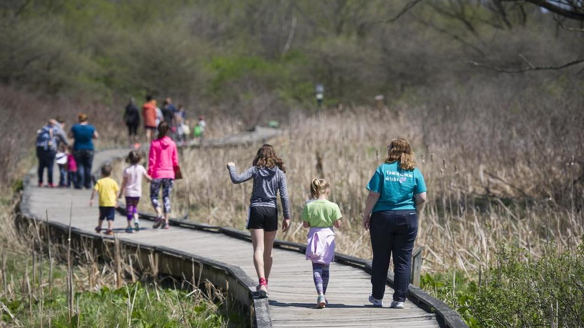 Families participate in a scavenger hunt at Millbrook Marsh Nature Center in April. Centre Region Parks and Recreation, which operates Millbrook Marsh and other sites, will celebrate its 50th anniversary on Saturday.