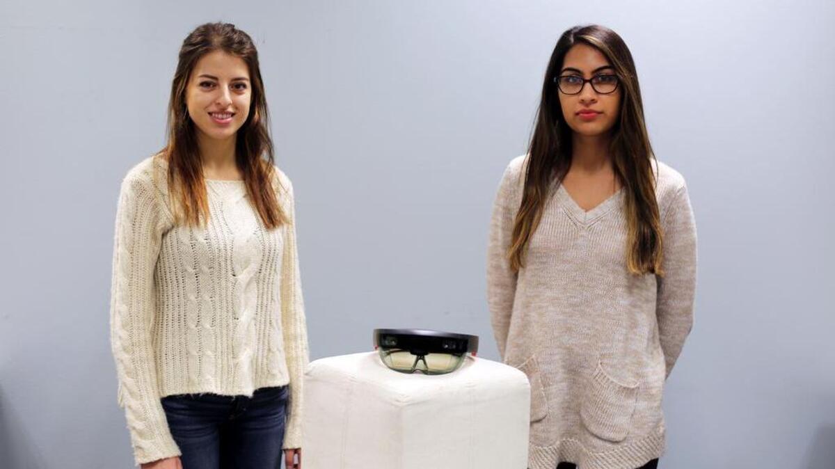 Co-Founders of Rain Reality Elaine Demopolis, left, and Ria Bhatia pose for a photo on Jan. 9 at Happy Valley Launchbox.