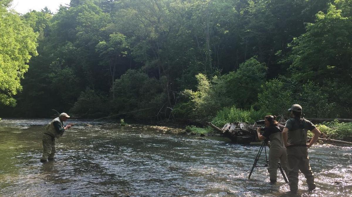 Lucas and Meigan Bell, right, film a scene from their upcoming documentary, “Live the Stream,” about legendary State College angler Joe Humphreys.