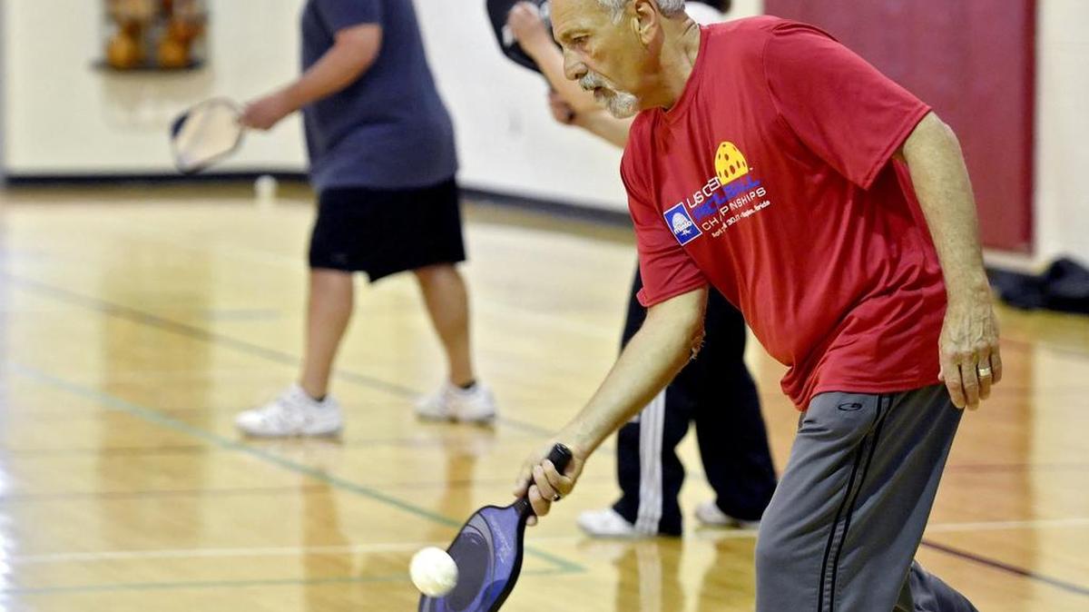 Bo Barbrow returns the ball during a May 4 game of Pickleball at the State College YMCA.