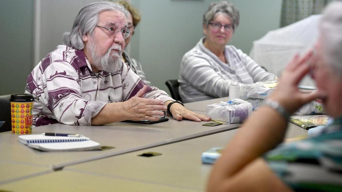 Oz Osborne relates a moment in his life to the book “Wonder” during the fourth Friday daytime book discussion group on Feb. 24 at the Centre County Library in Bellefonte.