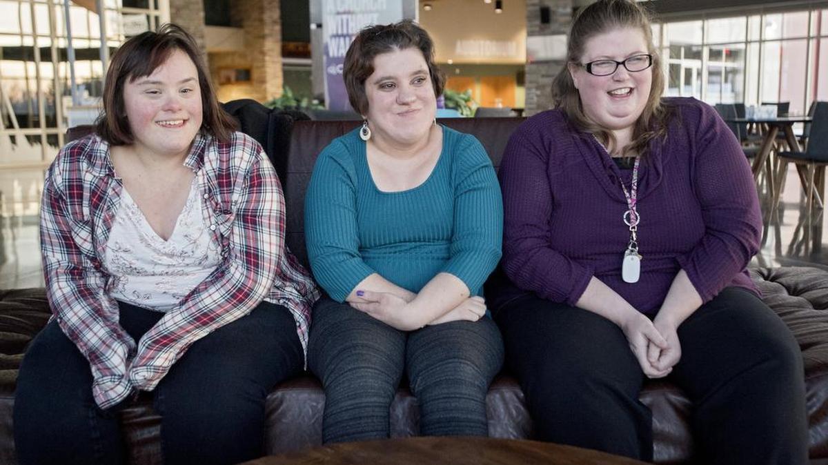 Sarah Pelchar, Brittany Petera and Claire Weaver share their excitement for Night to Shine on Tuesday at Calvary Church. The three friends hope to go dress shopping together.