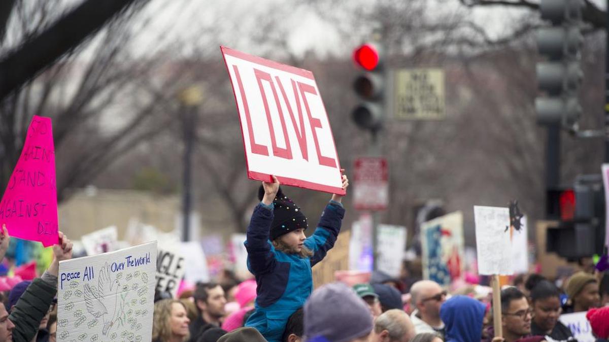 A child holds up a sign during the Women’s March on Washington on Jan. 21.