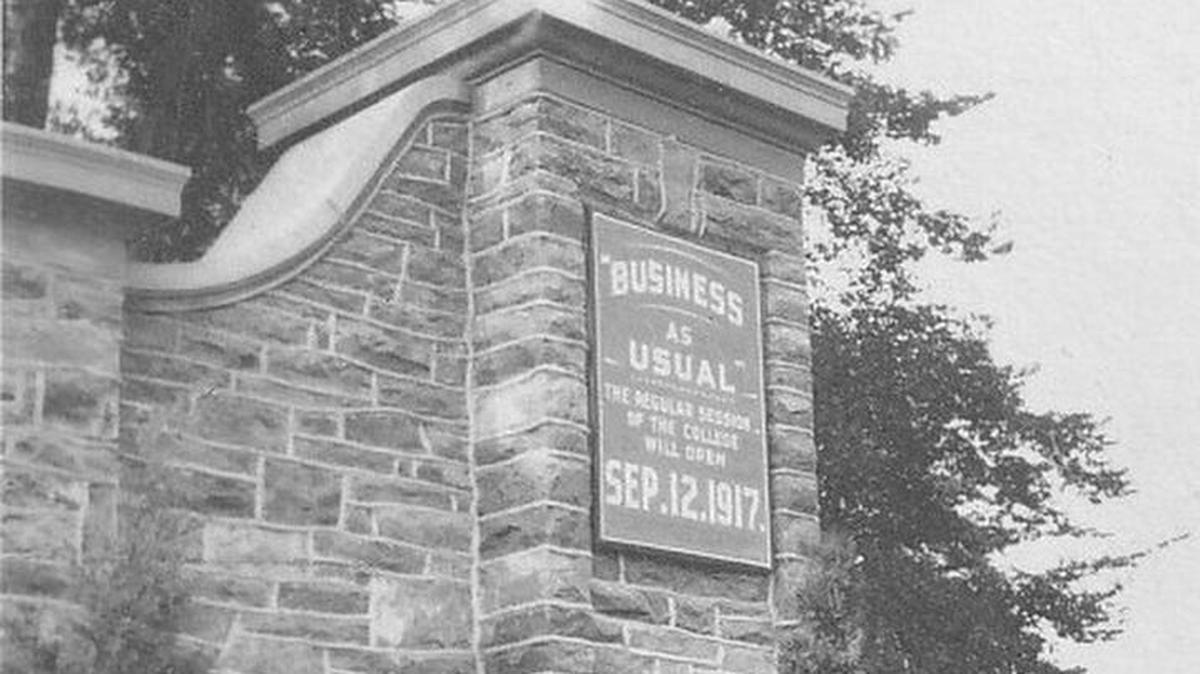 A sign on Penn State’s campus in 1917 let visitors and students know that the university would operate with “business as usual,” despite an influenza outbreak in the U.S.