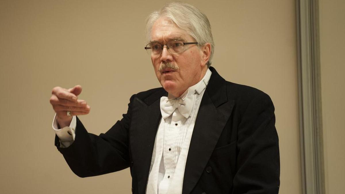 Tony Lentz performs a one-man performance of “A Christmas Carol” at Schlow Library on Dec. 15.