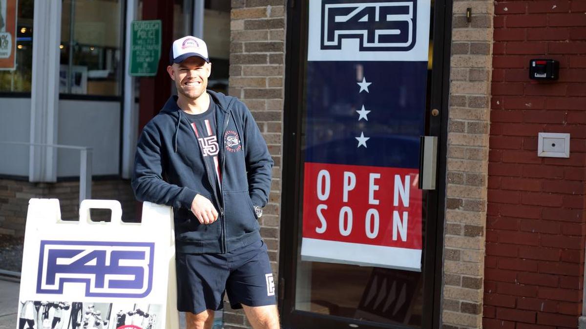 Owner of State College F45 Training fitness franchise J.R. Duffy poses for a photo outside the facility on Friday. Its set to open by the end of October at 232 E. College Ave.