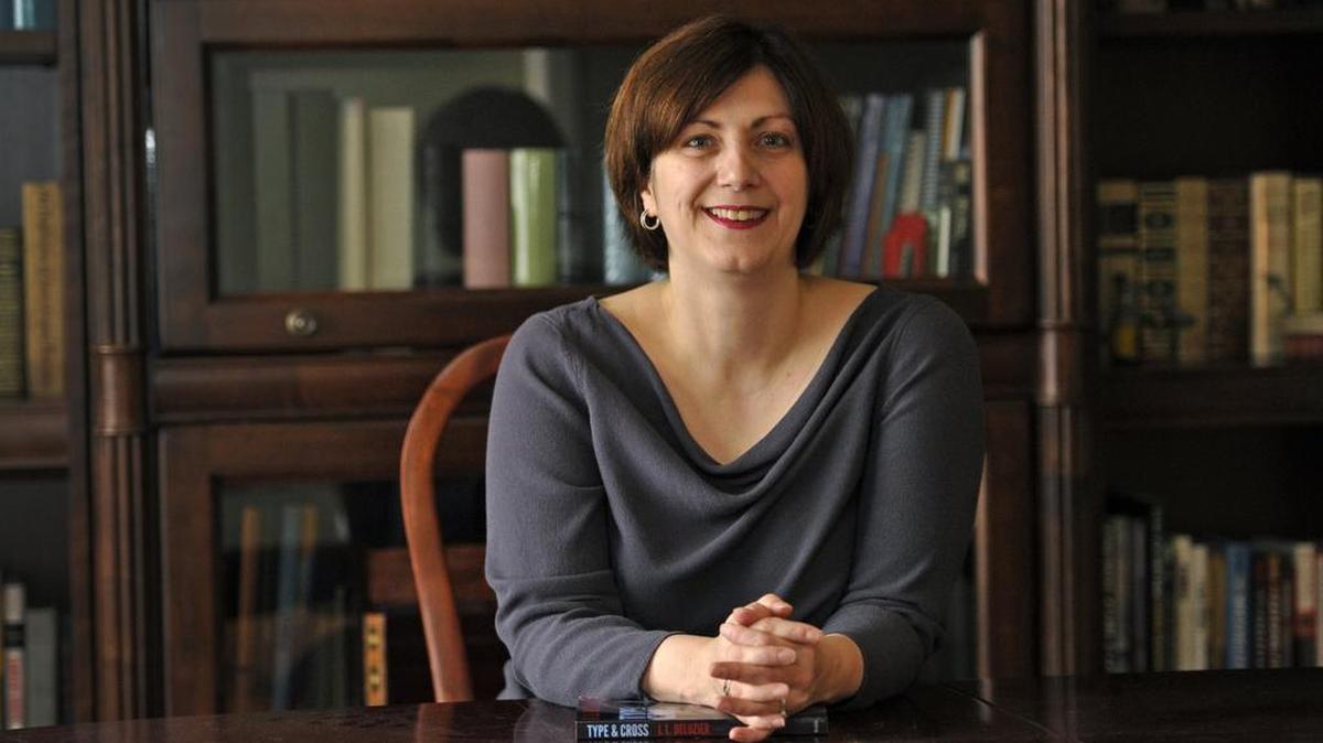 Jennifer Delozier, of State College, who is a physician for Veterans Affairs, recently published her first book, “Type & Cross.”