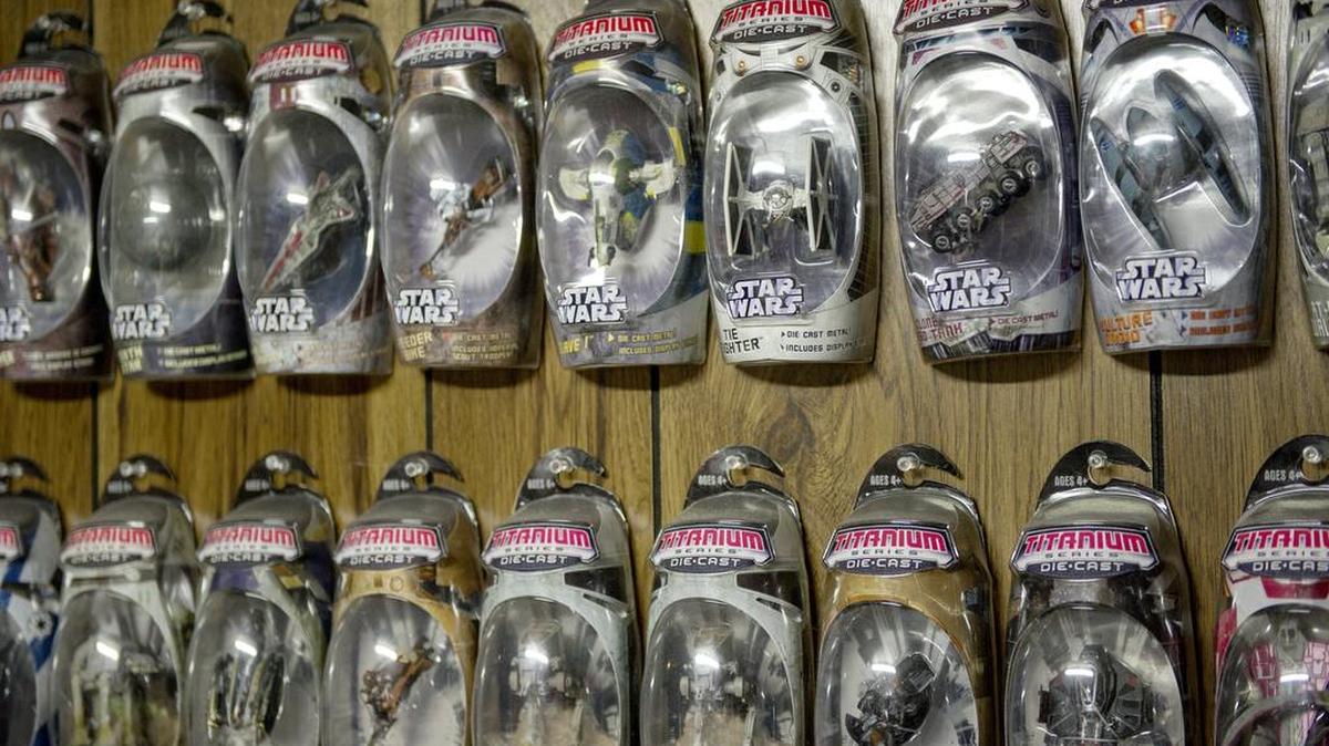 A series of Star Wars fighters lines the walls of Andrew Marzka's basement.